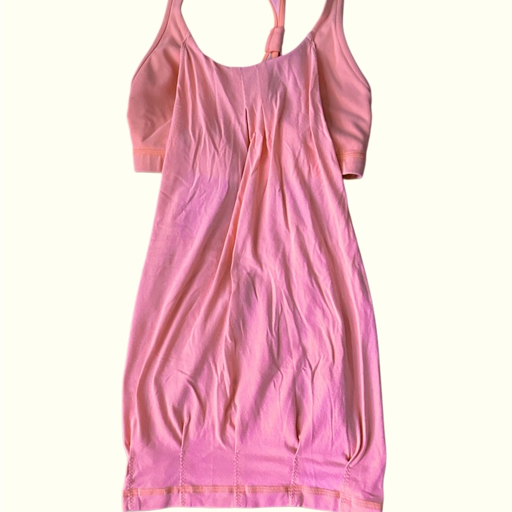 Lululemon tank. Fits like XS/S. Beautiful neon coral pink. In good condition.